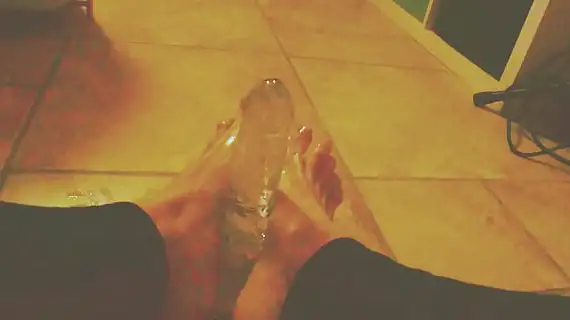 ariel ortiz plays with her feet with her toy 1733440919